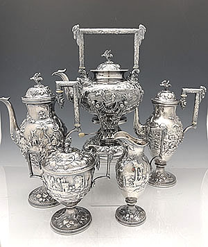 S Kirk & Son antique sterling silver tea and coffee set landscape pattern hand chased
